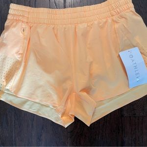 Orange 3” Hustle Athleta Shorts